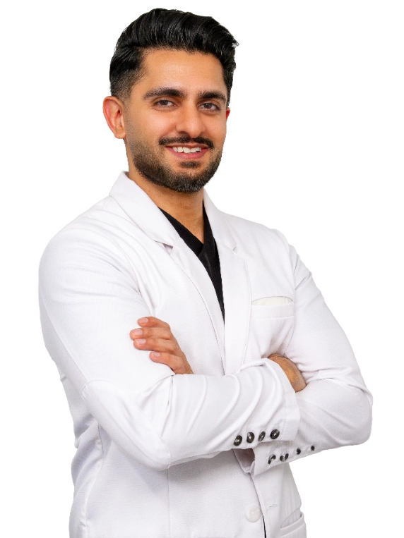 Professional headshot of Dr. Akash Mehta wearing a white lab coat, smiling at the camera against a black background. This is a standard medical professional portrait used for clinic or practice identification.